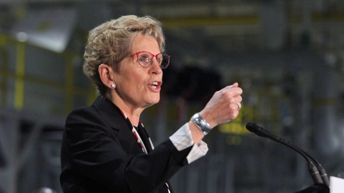 Ontario Premier Kathleen Wynne says she's "pleased" the state of New York has dropped proposed Buy American provisions from its state budget.