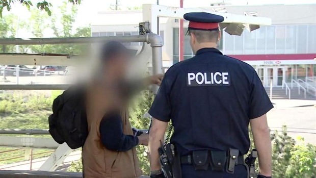 Police doing a random street check captured by GTA weekly Toronto News