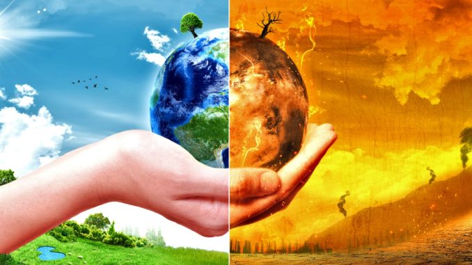a hand holding a normal earth and an earth on fire to signify climate change to GTA weekly Toronto news