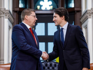 Prime Minister Justin Trudeau speaks with Saskatchewan Premier Scott Moe