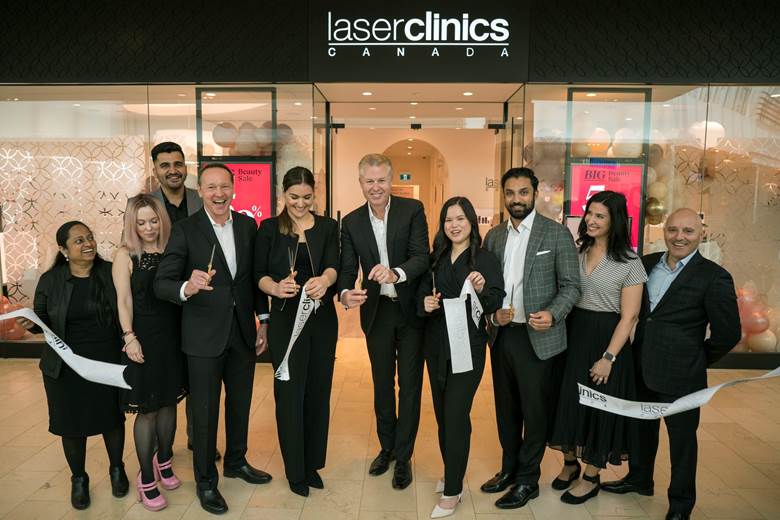 John Veitch, CEO of Laser Clinics Group, with scissors, joins George Jeffrey and Dr. Waqqas Jalil, respectively Managing Director and Medical Director at Laser Clinics Canada, and a team of medical aestheticians to celebrate the official opening of the brand’s 200th location, at Square One Shopping Centre in Mississauga, Ontario. The Australian-based advanced beauty leader continues its expansion in international markets, including this newest Toronto region location, its second in Canada, with more on the way. PHOTO CREDIT: J.P. Moczulski / LASER CLINICS